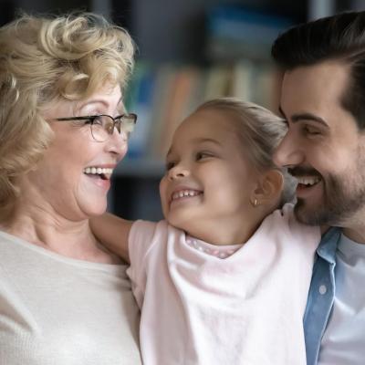 Smiling grandmother with son and granddoughter 